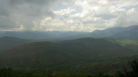 Clouds over mountains, time lapse Stock Footage 79534285