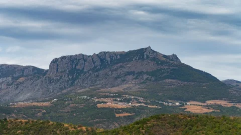 Clouds over mountains, time lapse Video stock 116265376
