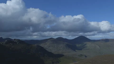Clouds over mountains time lapse Video stock 140723385