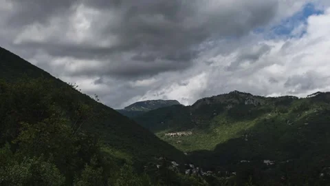 Clouds over the mountains - time-lapse Video stock 246958755