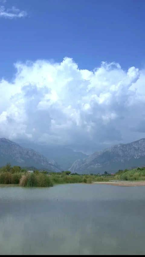 Clouds over the mountains. Timelapse. Vertical video. Stock Footage 253019850
