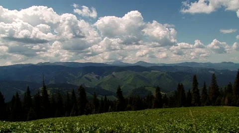 Clouds over mountains triangular Stock Footage 69009047