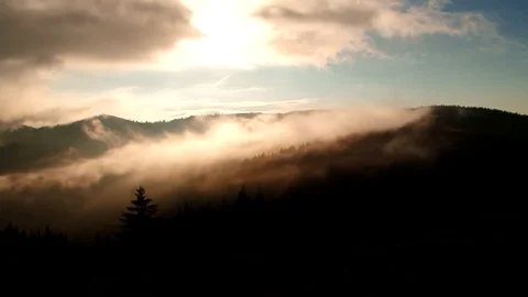 Clouds over the mountains when the sun rises Stock Footage 70363644