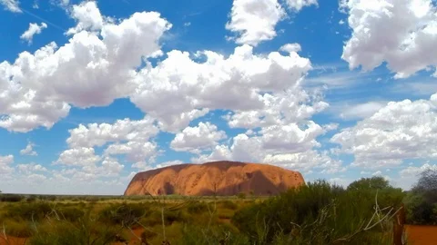 Clouds over Mt. Uluru in Australia Stockbeeldmateriaal 102427635