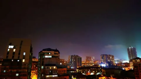 Clouds over the night city, time lapse Stock Footage 151669300
