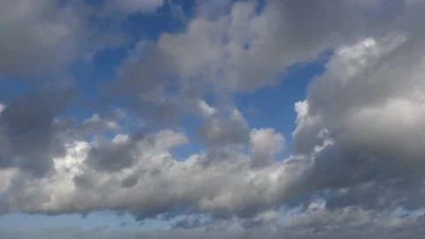 Clouds over the ocean with blue sky - cloudscape background - time lapse Stock Footage 143765173