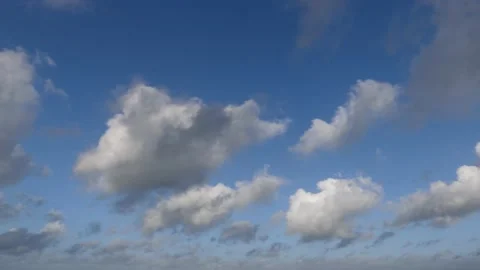 Clouds over the ocean with blue sky - cloudscape background - time lapse Stock Footage 143768181