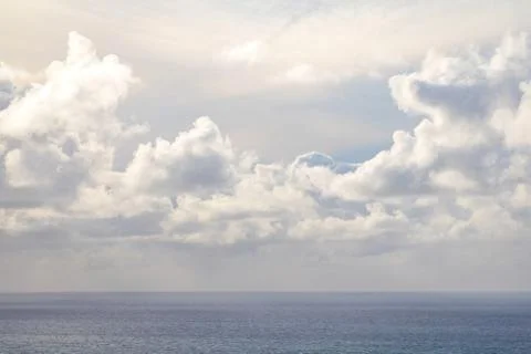 Clouds over ocean horizon Stock Photos
