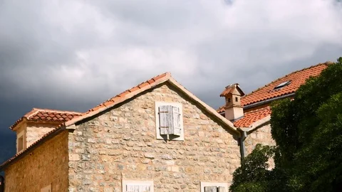 Clouds over old town time lapse Stock Footage 80944208