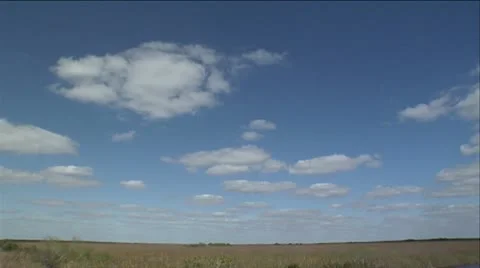 Clouds over open field Stock Footage 12761439