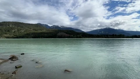 Clouds Over Pale Turquoise Green Lake Shoreline Near Whistler Canada Stock-Footage 346985208