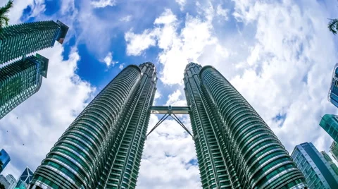 Clouds over the Petronas tower in Kuala Lumpur Stock Footage 64574923