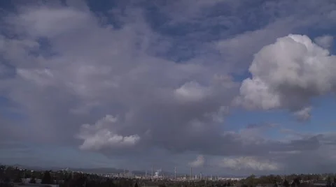 Clouds over Refinery 01 Stock Footage 942988