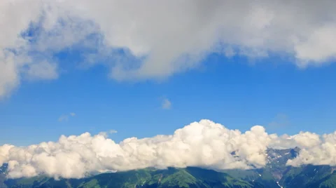 Clouds over the ridge. TimeLapse. Krasnaya Polyana, Sochi, Russia. 4K Vídeo Stock 53607823