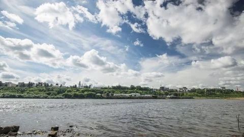 Clouds over the river in the city Stock Footage 71989899