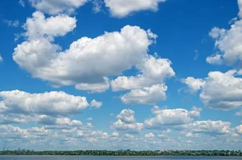 Clouds over river Stock Photos