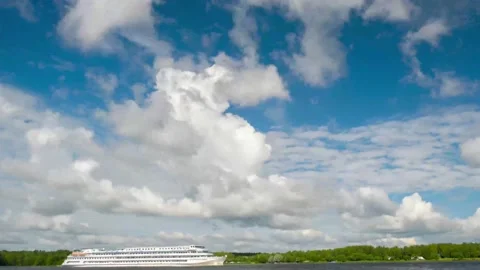 Clouds over the river on a sunny summer day Stock Footage 205565604