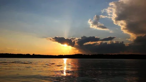 Clouds over the river at sunset Stock Footage 155243436
