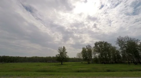Clouds over the road. The path from Barabinsk - Kozhurla village Stock Footage 59198379