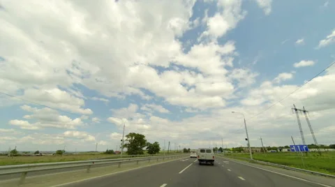 Clouds over the road. The path from Bolshiye Klyuchischi village Stock Footage 56694741