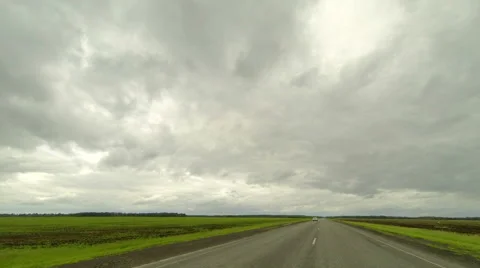 Clouds over the road. The path from Ishim, Tyumen region, Russia, Full HD Stock Footage 59517975