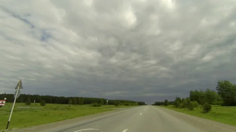 Clouds over the road. The path from Kamyshlov village, Sverdlovsk region, Russia Stock Footage 59517899