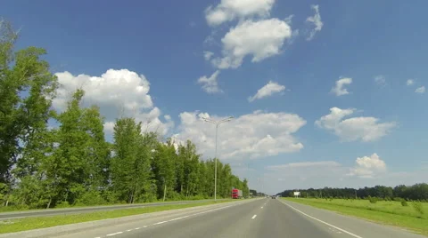 Clouds over the road. The path from Novochuvashskiy village Stock Footage 58586412