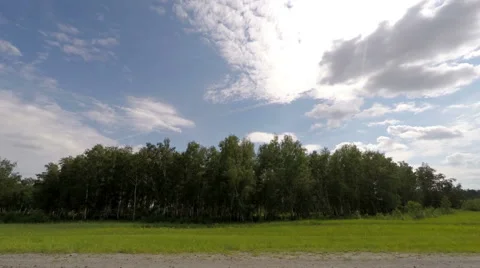Clouds over the road. The path from Ubinskoe village - Lebedevskiy village, Stock Footage 59439952