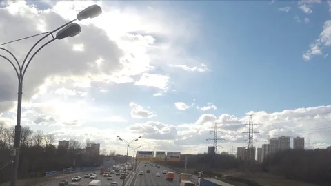 Clouds over the road in spring day timelapse Stock Footage 78019634