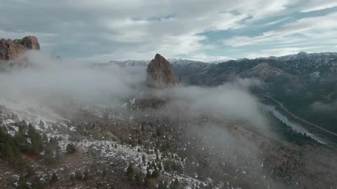 Clouds over rock valley with a river in Patagonia Stock Footage 159467164