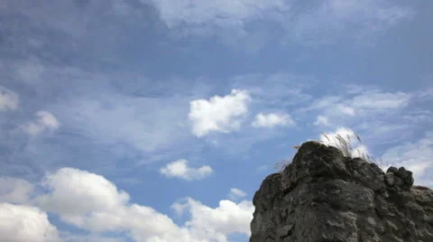 Clouds over the rocks Stockbeeldmateriaal 53828361