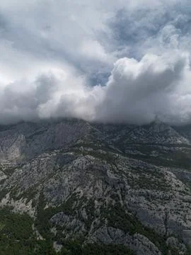 Clouds over rocks. View of the top of Mount Vosac, Biokovo, Croatia. Mounta.. Stock Photos