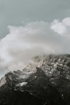 Clouds over a rugged summit in the Ladinian Dolomites, Italy Stock Photos