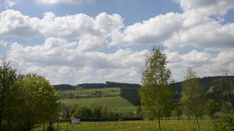 Clouds over rural landscape time lapse Stockbeeldmateriaal 126917095