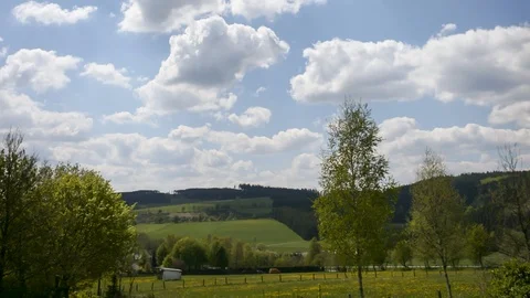 Clouds over rural landscape time lapse Stockbeeldmateriaal 126917229
