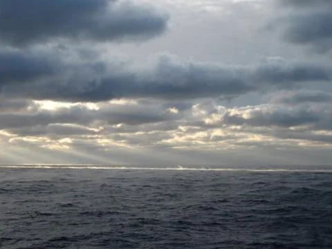 Clouds over the sea Stock Photos
