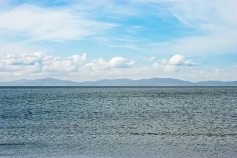 Clouds over the sea Stock Photos