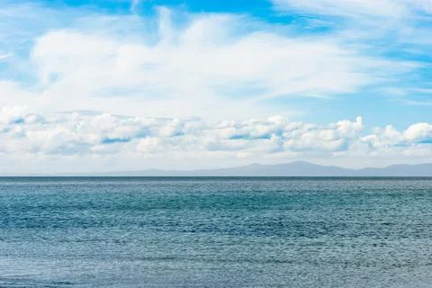 Clouds over the sea Stock Photos