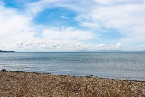 Clouds over the sea Stock Photos