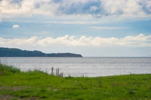 Clouds over the sea Stock Photos
