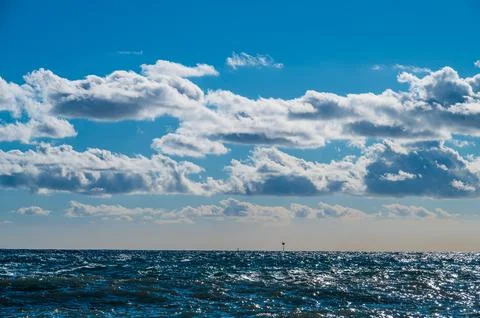 Clouds over the sea Stock Photos