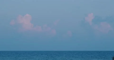 Clouds over the sea at sunset Stock Footage 133722080