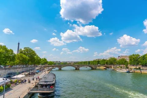 Clouds over Seine river in downtown Paris Stock Photos