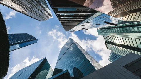 Clouds over skyscrapers Stock Footage 129897947