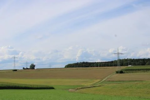 Clouds over small power line Stock Photos