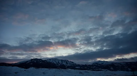 Clouds Over Snow Capped Peaks Outside Yellowstone Stock Footage 42402799