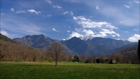 Clouds over snow covered Pic du Canigou Stock Footage 69900304
