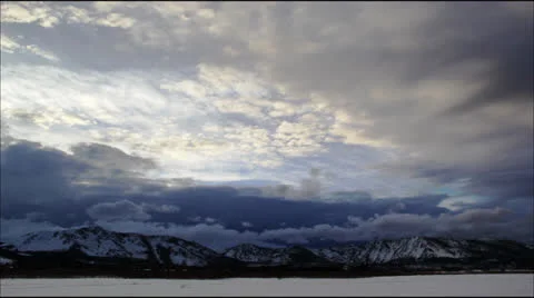 Clouds over Snowy Mountain Time Lapse Stock Footage 24828057