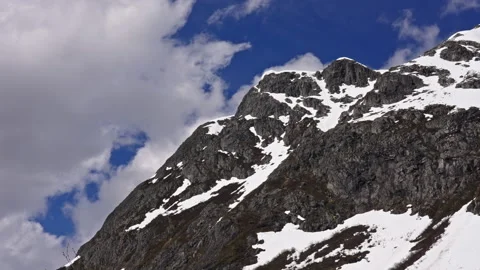 Clouds over snowy mountains Stock Footage 267685290