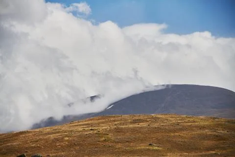 Clouds over the steppe open spaces, storm clouds over the hills. The Ukok Pla Stock Photos